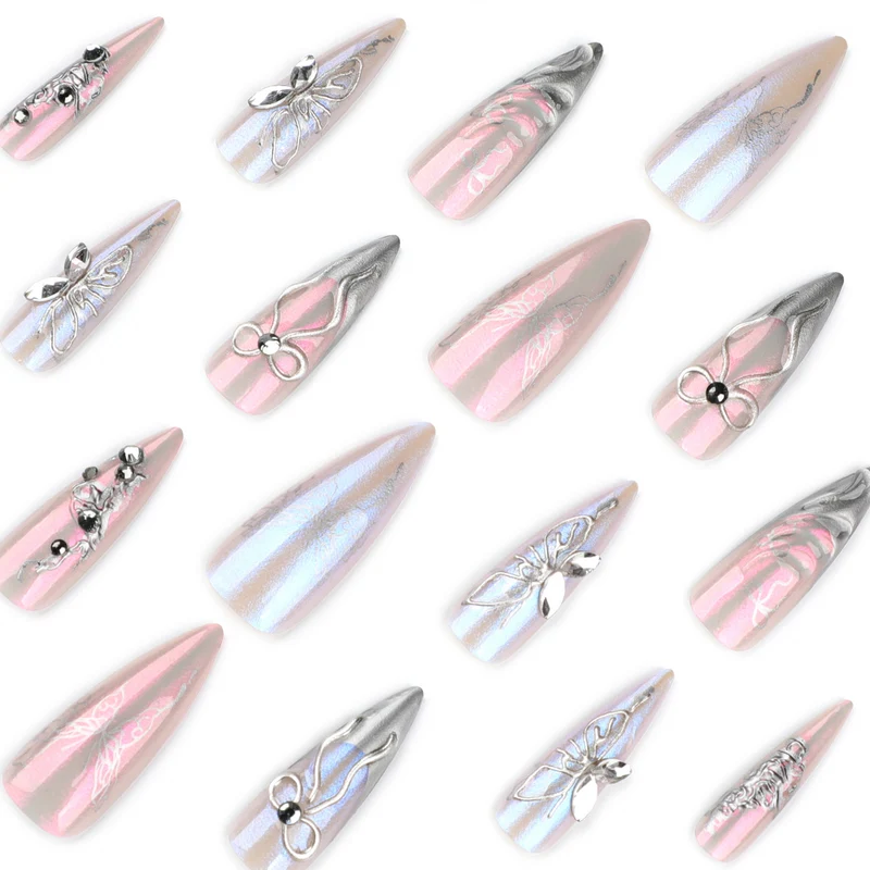 Artful stiletto nails with delicate silver casting decoration Stornfield
