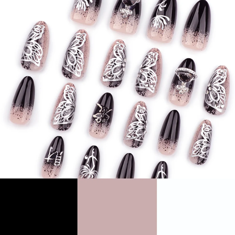 Artful stiletto nails with delicate embellishments and glamour accents Stornfield