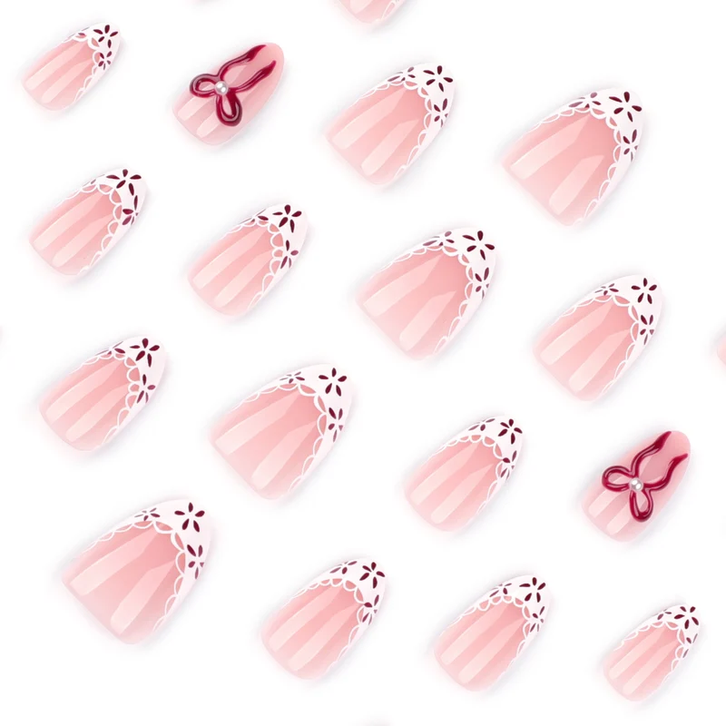 Artful stiletto nails with delicate floral accents Stornfield
