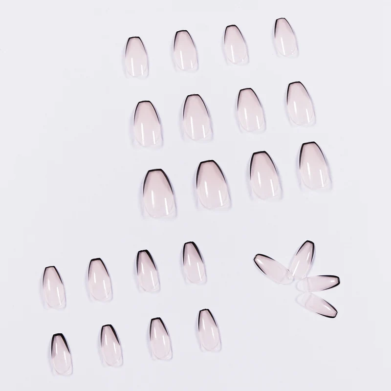 Artful stiletto nails with elegant black tip decoration Stornfield
