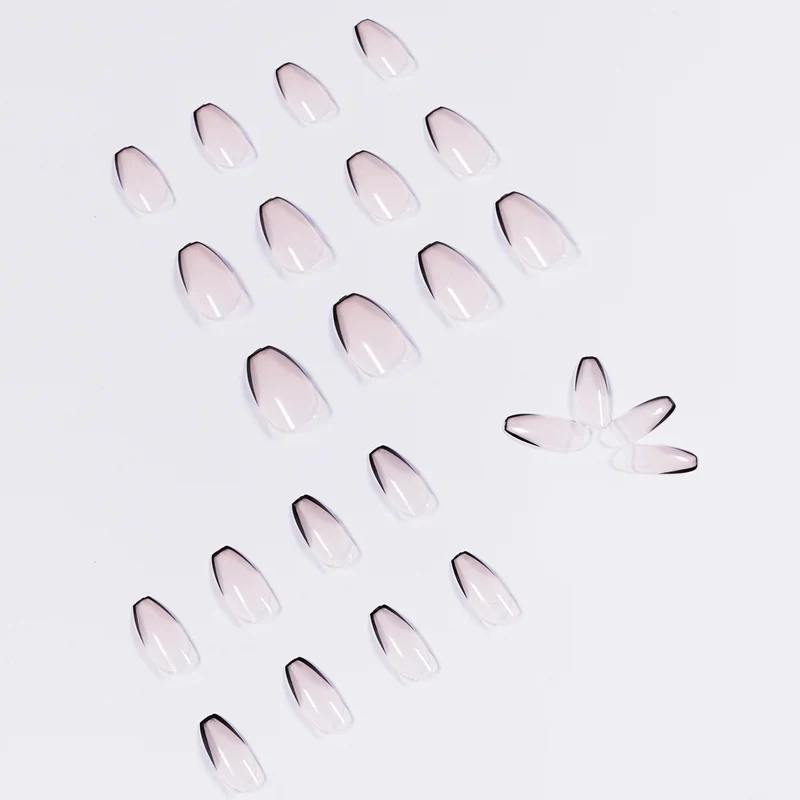 Artful stiletto nails with elegant black tip decoration Stornfield