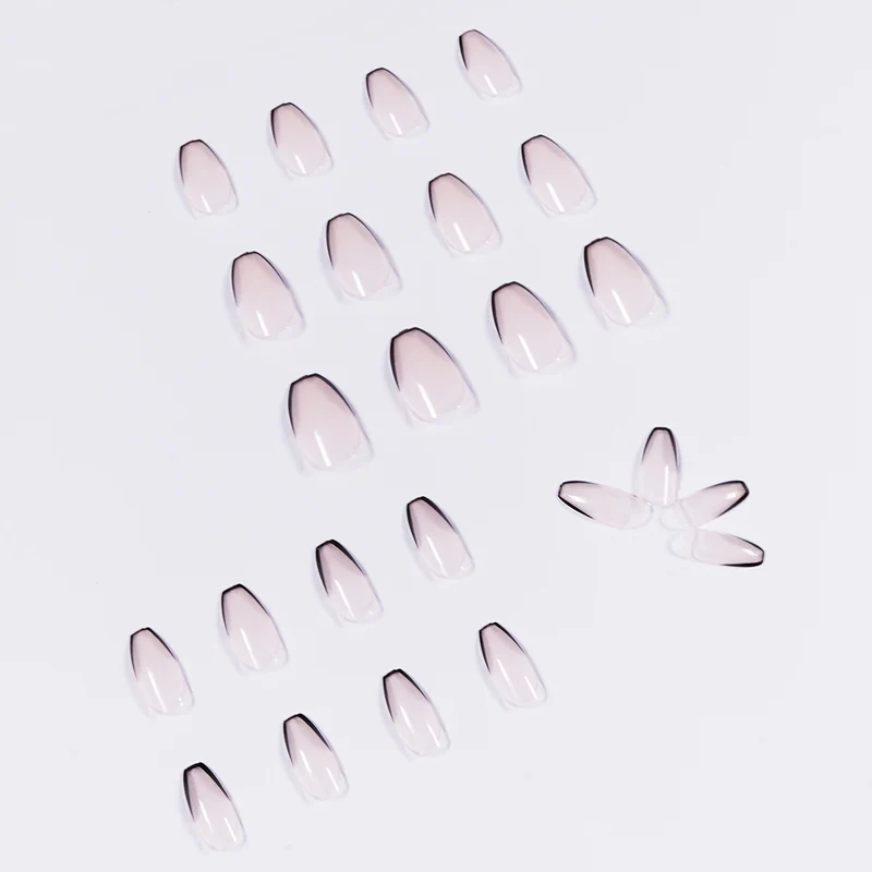 Artful stiletto nails with elegant black tip decoration Stornfield