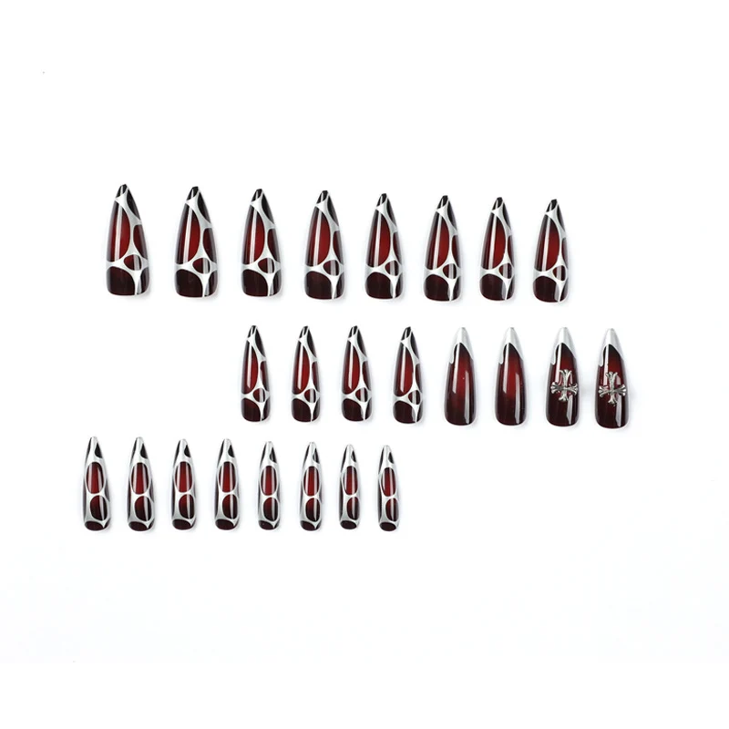 Artful Stiletto Nails with Elegant Cross Decoration Stornfield