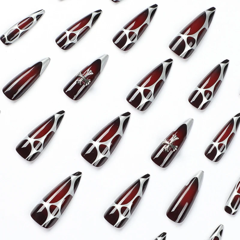 Artful Stiletto Nails with Elegant Cross Decoration Stornfield