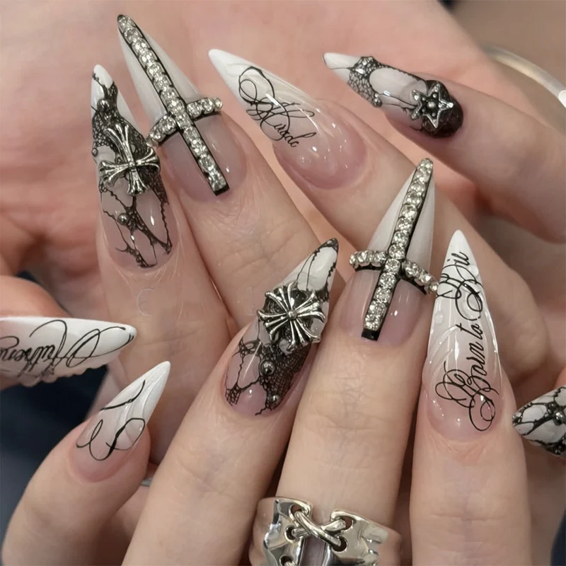 Artful stiletto nails with elegant embellishments Stornfield