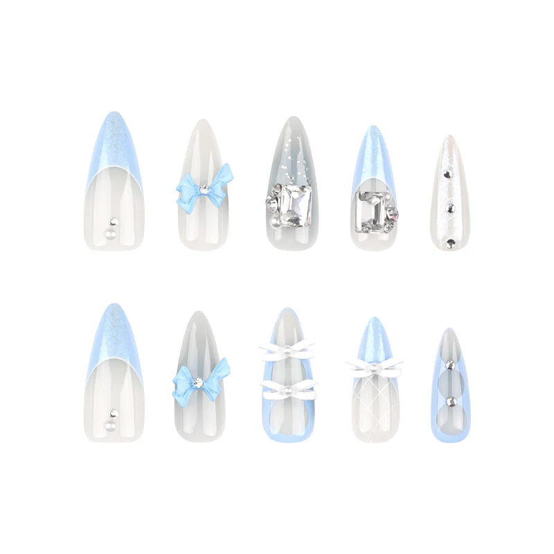 Artistic stiletto nails with elegant jewelry accents Stornfield