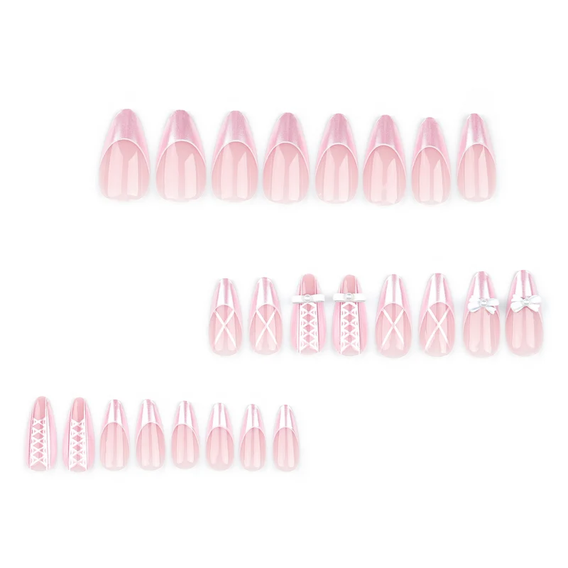Artistic stiletto nails with elegant pearl and bow accents Stornfield