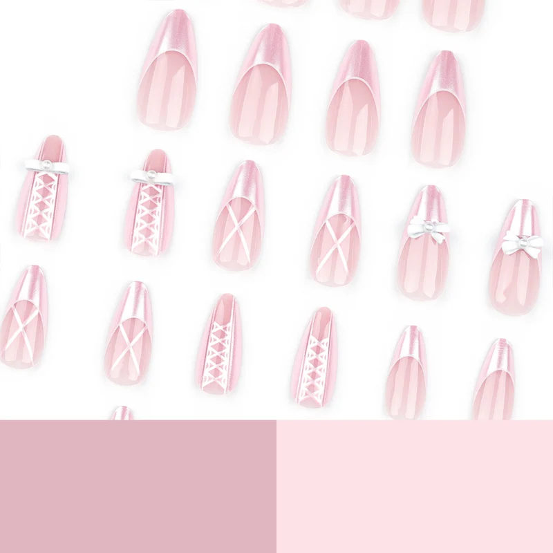 Artistic stiletto nails with elegant pearl and bow accents Stornfield
