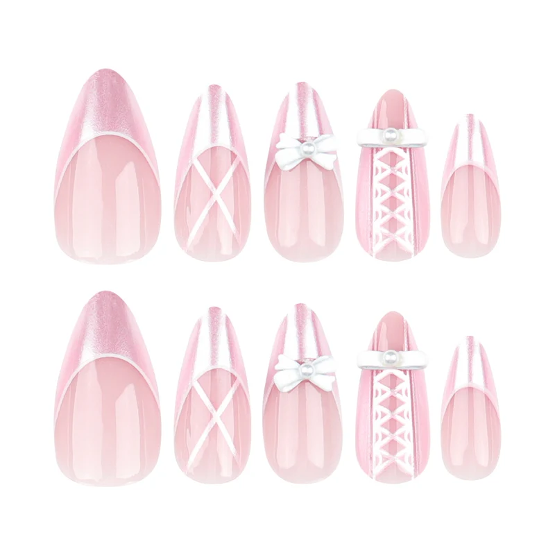 Artistic stiletto nails with elegant pearl and bow accents Stornfield