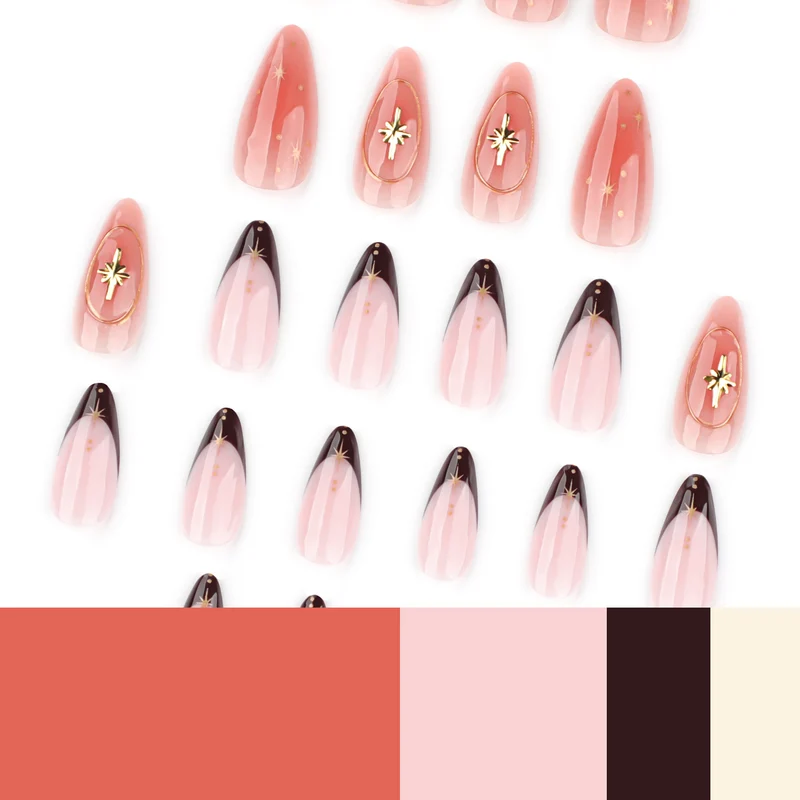 Artful stiletto nails with elegant gold embellishments Stornfield