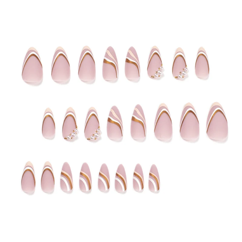 Artful stiletto nails with elegant gold and white accents Stornfield