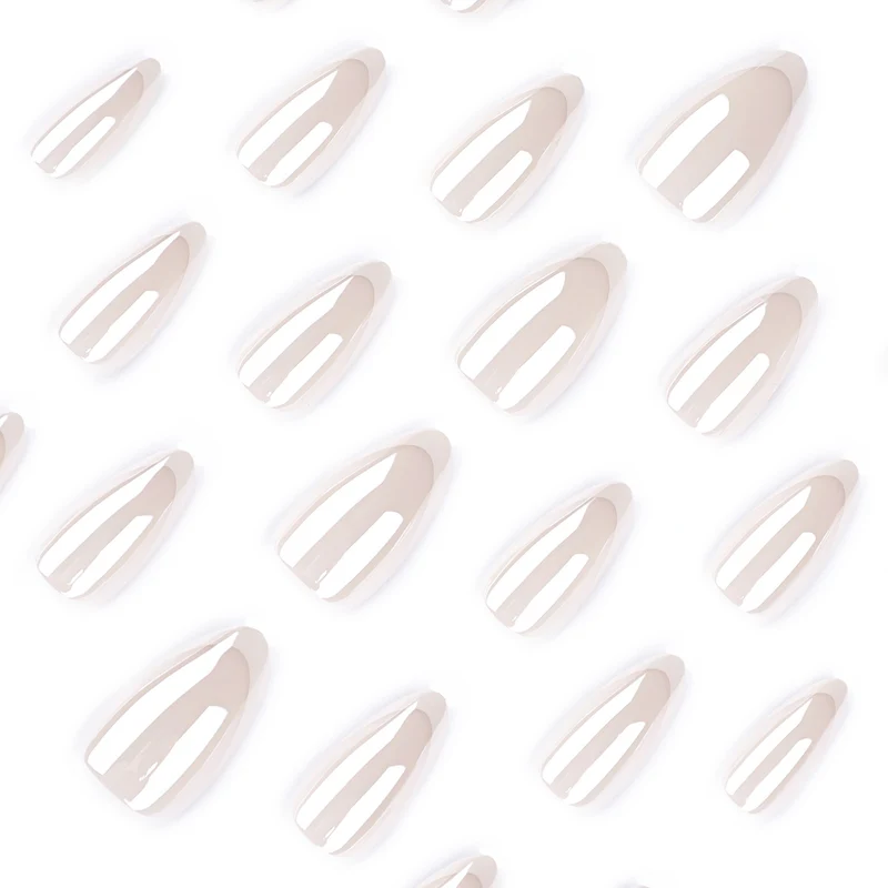 Artistic stiletto nails with elegant French tip embellishments Stornfield