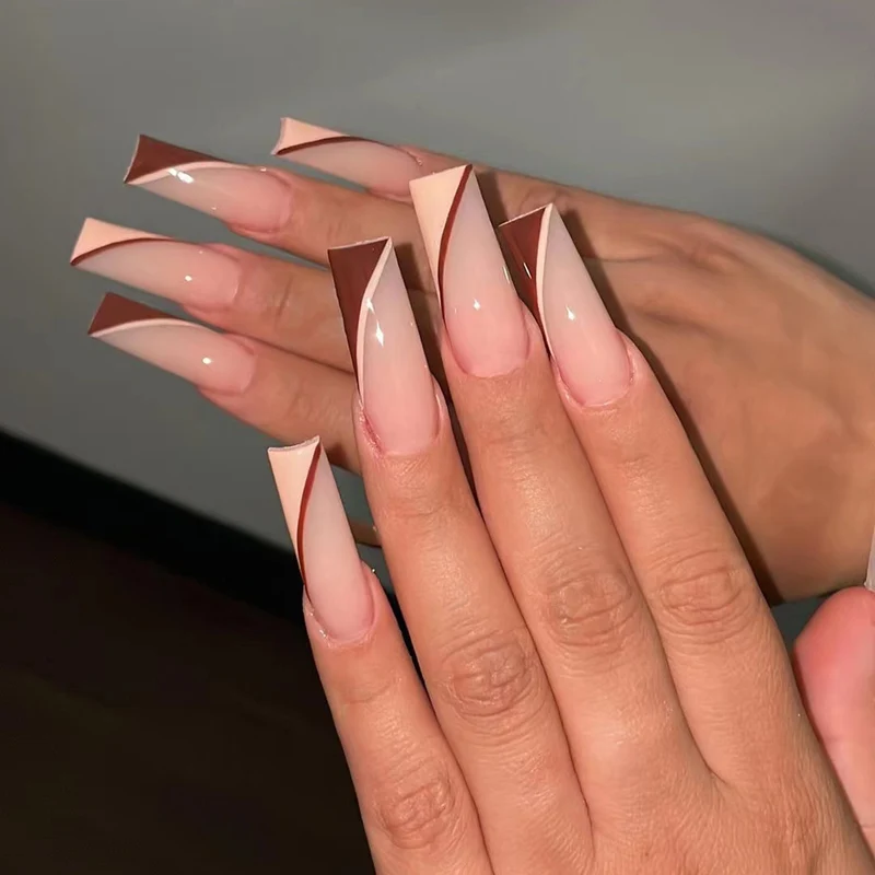 Artful stiletto nails with elegant gradient and geometric accents Stornfield