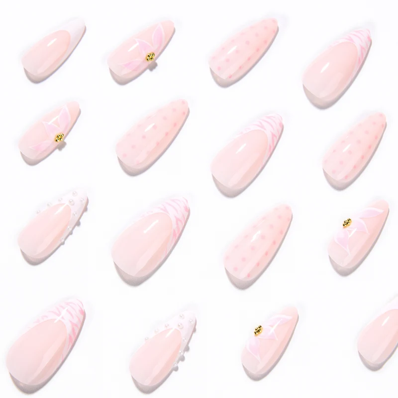 Artistic stiletto nails with elegant 3D decorations Stornfield