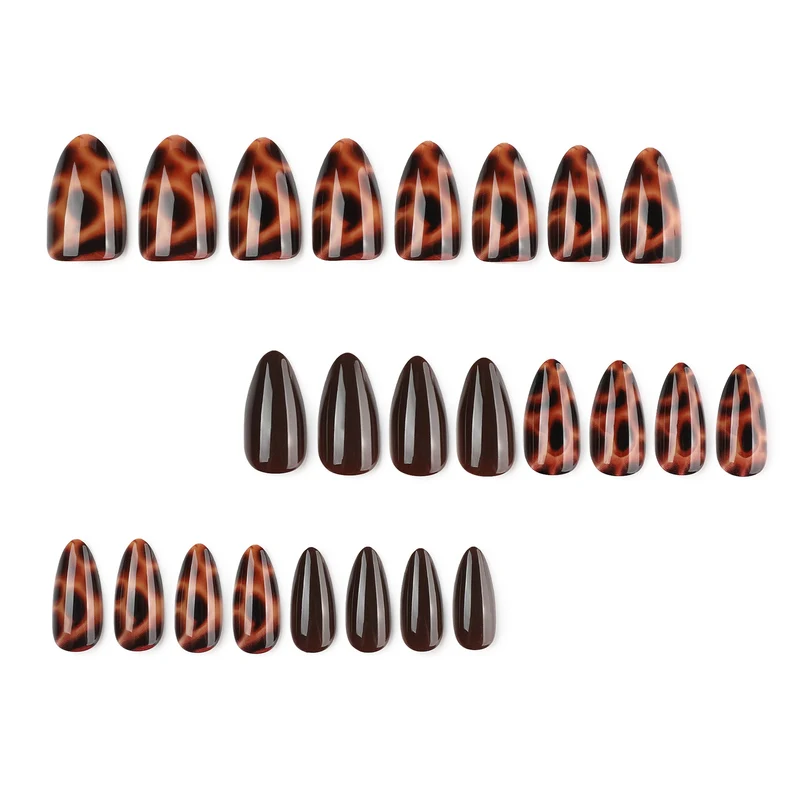 Artful stiletto nails with elegant leopard pattern Stornfield