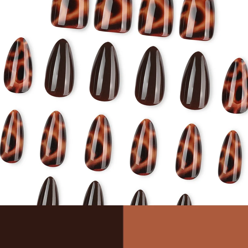 Artful stiletto nails with elegant leopard pattern Stornfield