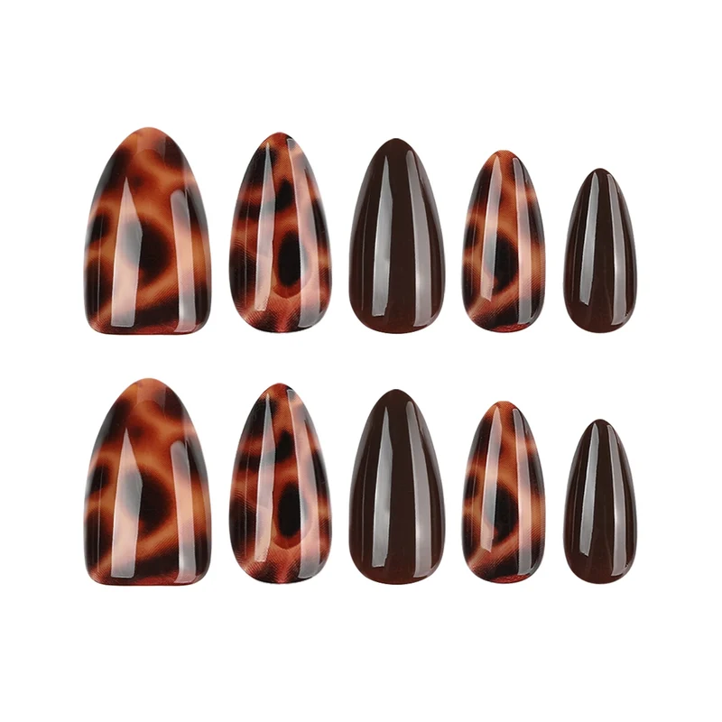 Artful stiletto nails with elegant leopard pattern Stornfield
