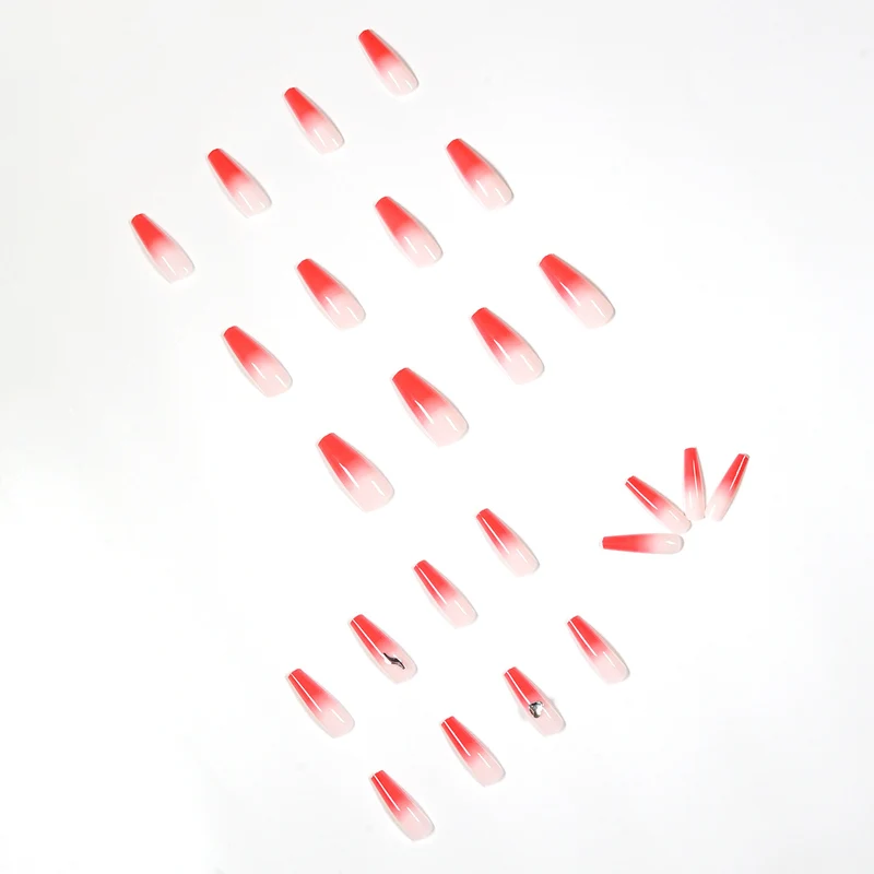 Artful stiletto nails with elegant gradient and rhinestone embellishment Stornfield