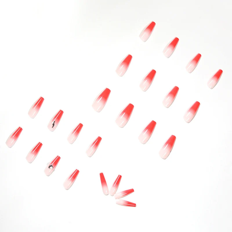 Artful stiletto nails with elegant gradient and rhinestone embellishment Stornfield