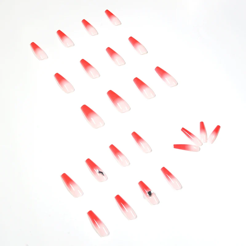 Artful stiletto nails with elegant gradient and rhinestone embellishment Stornfield