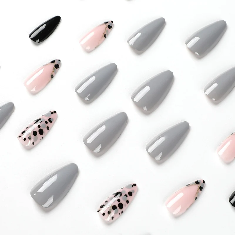 Artful stiletto nails with elegant accent design Stornfield