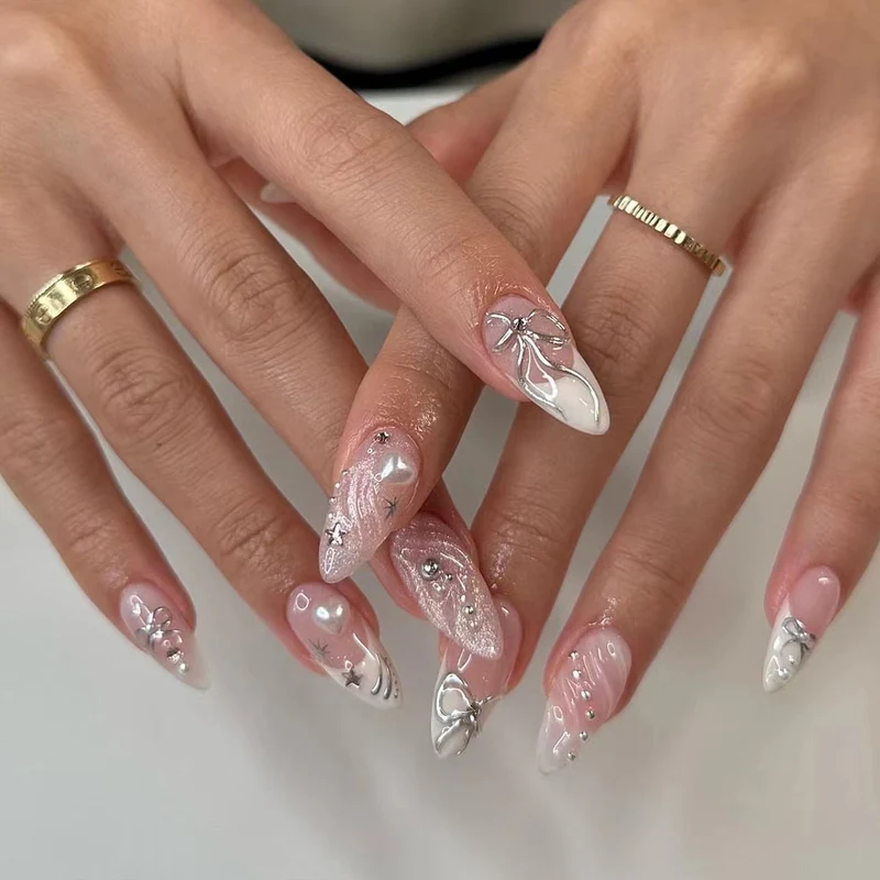 Artful stiletto nails with elegant decoration Stornfield