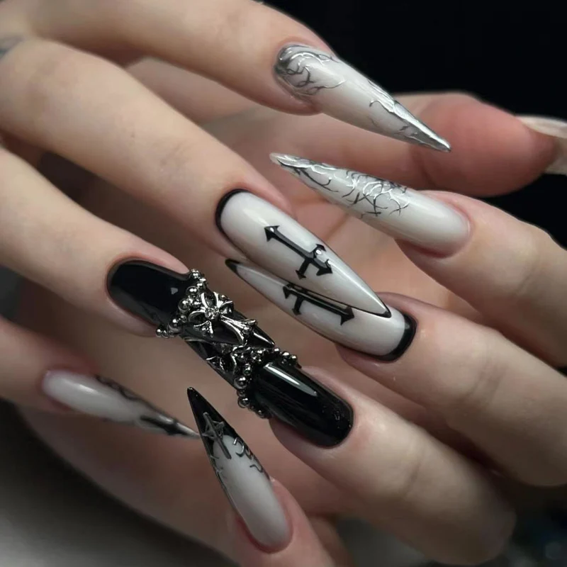Artistic stiletto nails with unique 3D details and elegant accents Stornfield