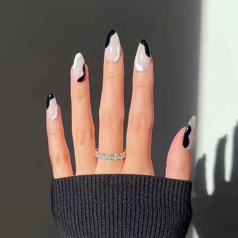 Artful Stiletto Nails with Abstract Color Design Stornfield