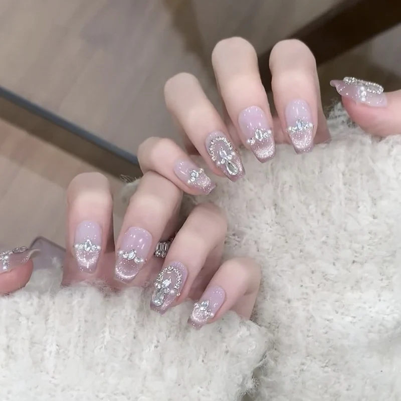 Artful Press-On Nails with Glitter and Rhinestone Decorations Stornfield