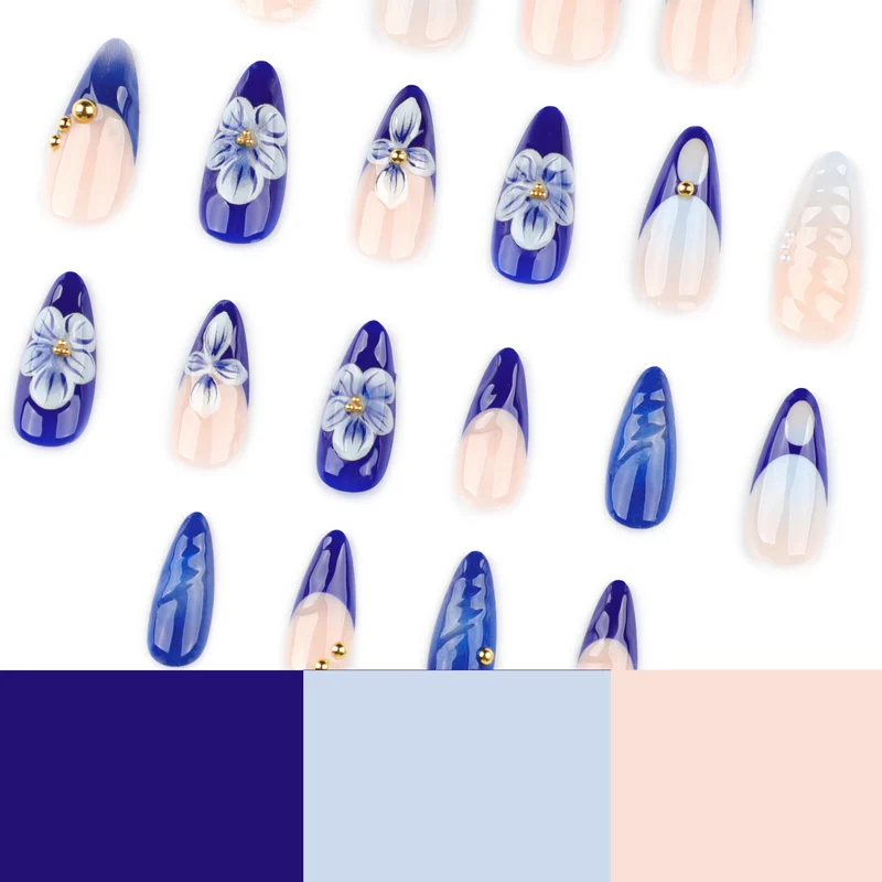 Artistic nail art with floral accents and glitter embellishments Stornfield