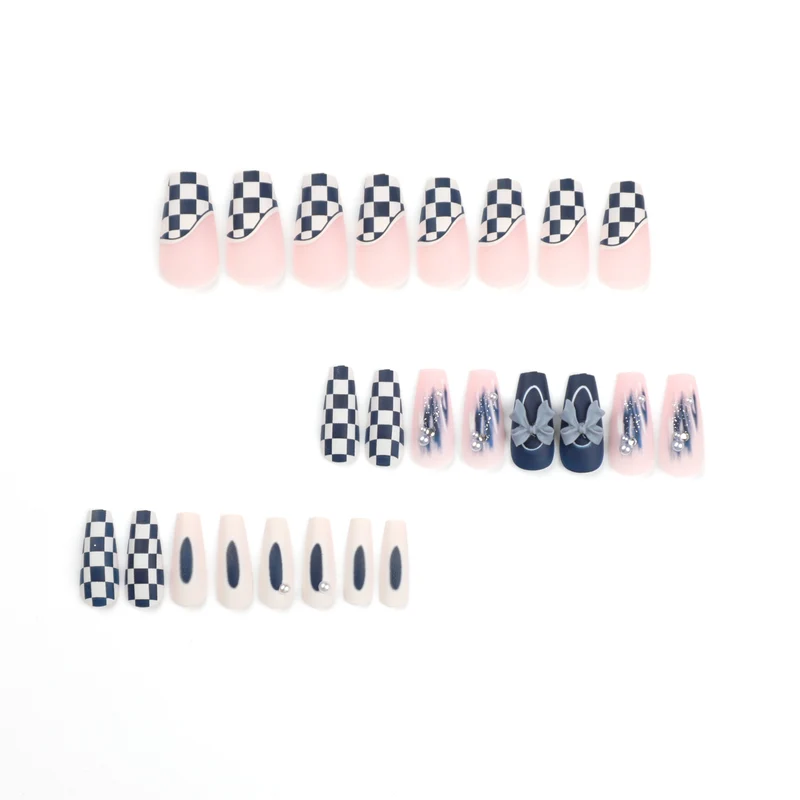 Artful nail decoration with bows and plaid pattern Stornfield