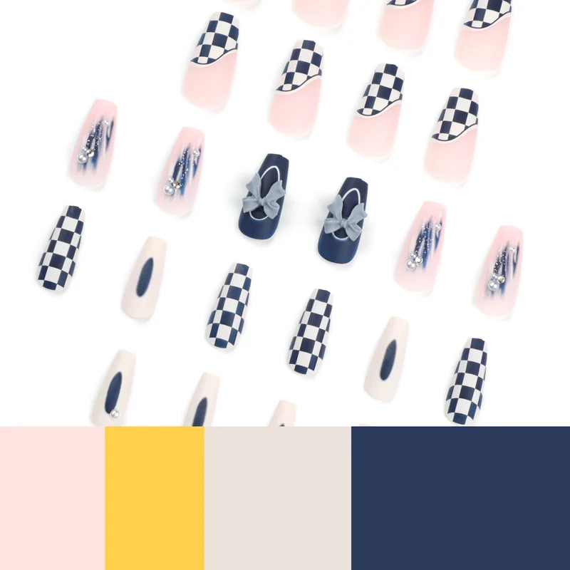 Artful nail decoration with bows and plaid pattern Stornfield