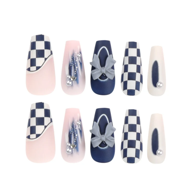 Artful nail decoration with bows and plaid pattern Stornfield