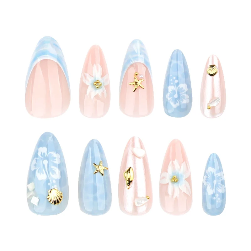 Artful nail extensions with delicate floral designs and glitter accents Stornfield
