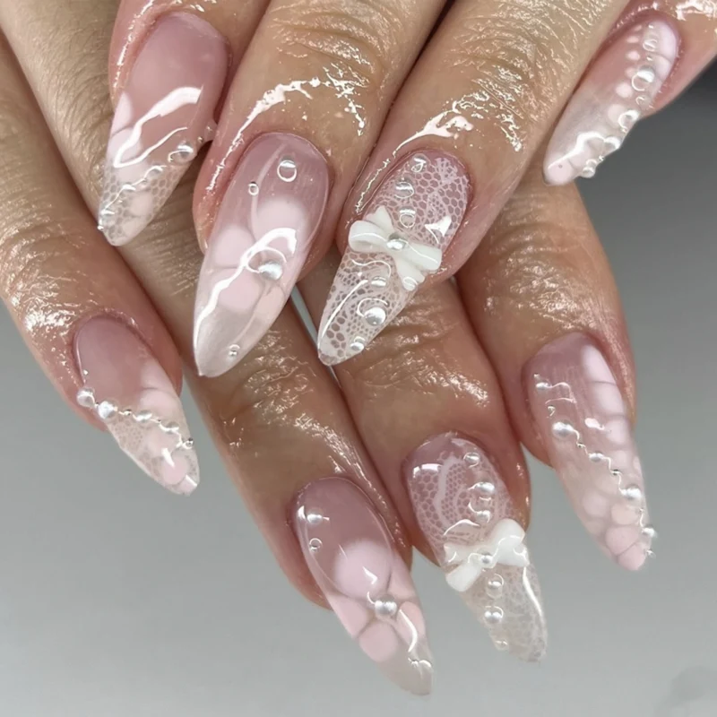 Artful Nail Extensions with Delicate Accents Stornfield