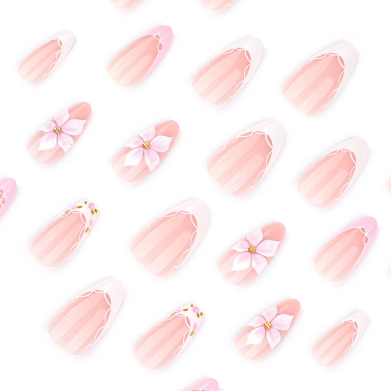 Artful nail extensions with delicate floral pattern and elegant accents Stornfield