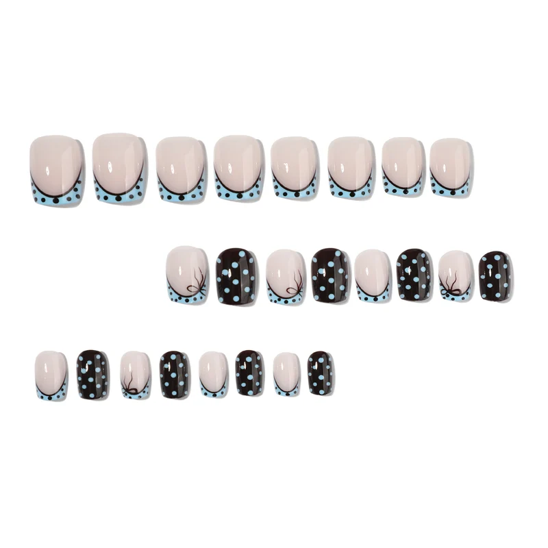 Artful nail extensions with playful dots and elegant design Stornfield