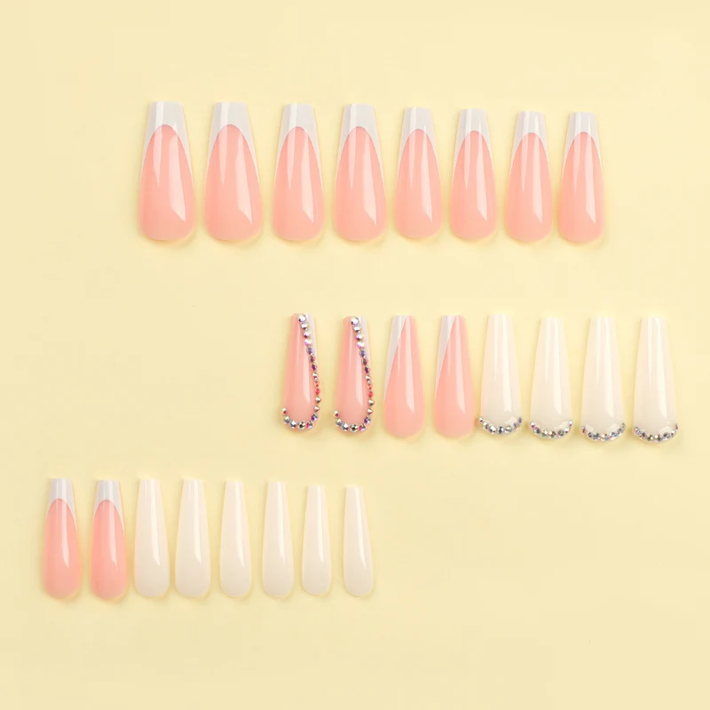 Artful nail extensions with rhinestone embellished accents Stornfield