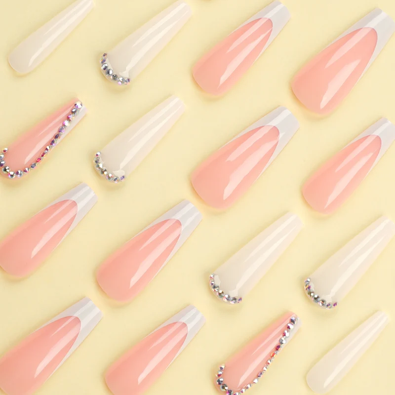Artful nail extensions with rhinestone embellished accents Stornfield