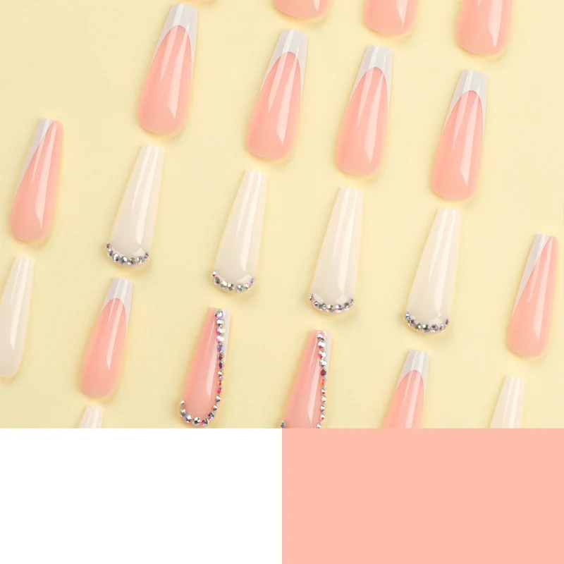 Artful nail extensions with rhinestone embellished accents Stornfield