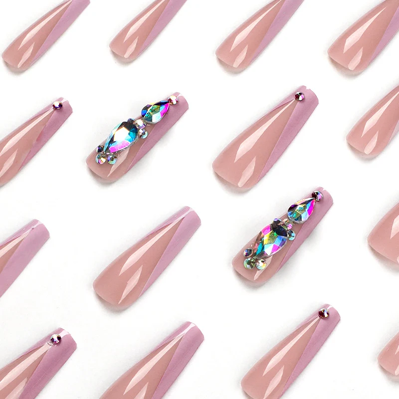 Artful nail extensions with rhinestone and flower accents Stornfield