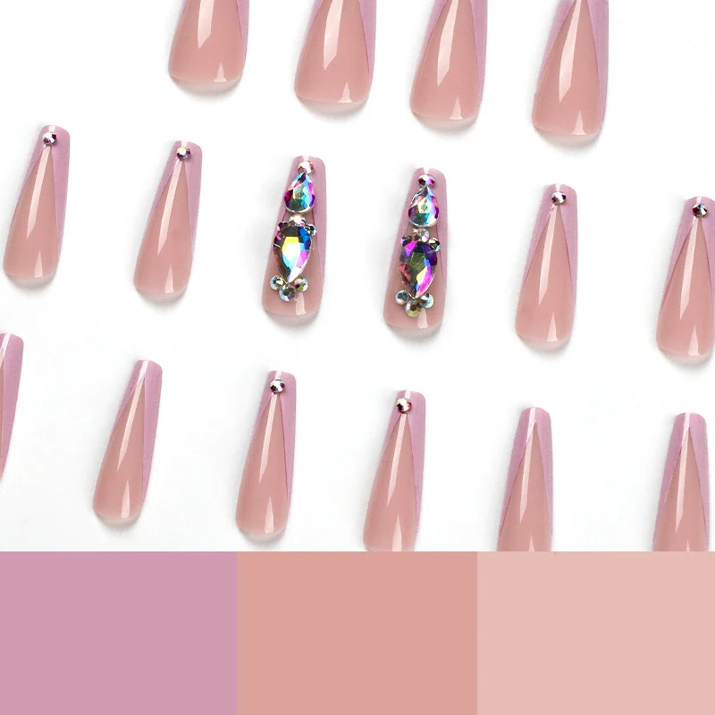 Artful nail extensions with rhinestone and flower accents Stornfield