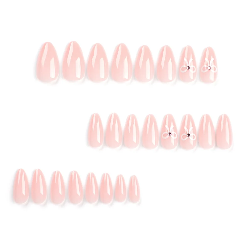 Artful Nail Extensions with Bow Decoration Stornfield