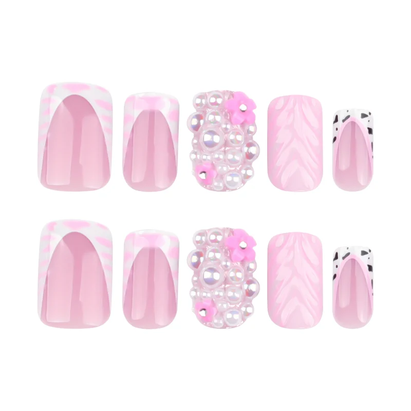 Artful nail extensions with mother-of-pearl effects and delicate design Stornfield