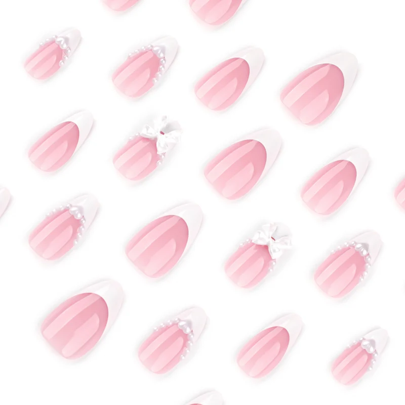 Artful Nail Extensions with Bead and Bow Designs Stornfield