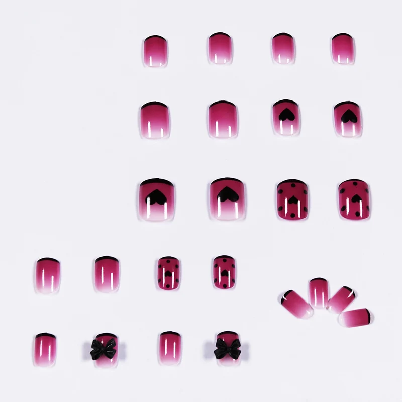 Artistic nail extensions with cute bow and heart designs Stornfield