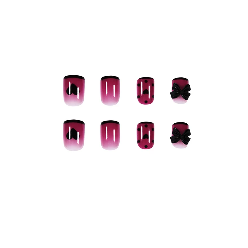 Artistic nail extensions with cute bow and heart designs Stornfield