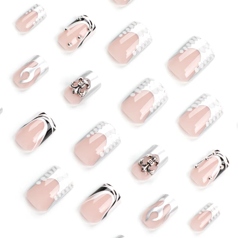 Artistic nail extensions with metallic embellishments Stornfield