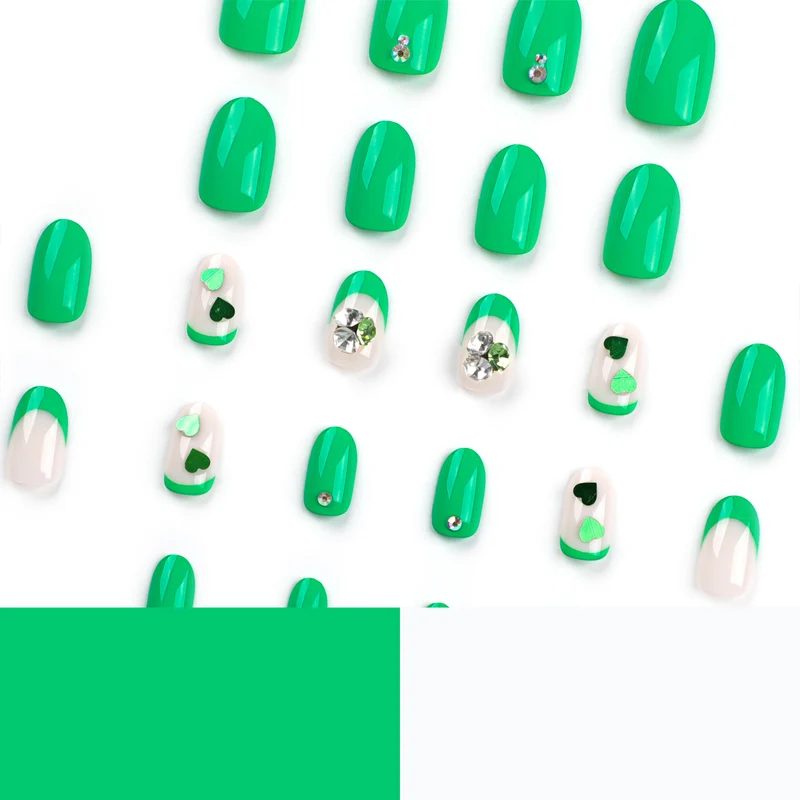 Artistic Nail Extensions with Lovable Heart Patterns and Glitter Accents Stornfield