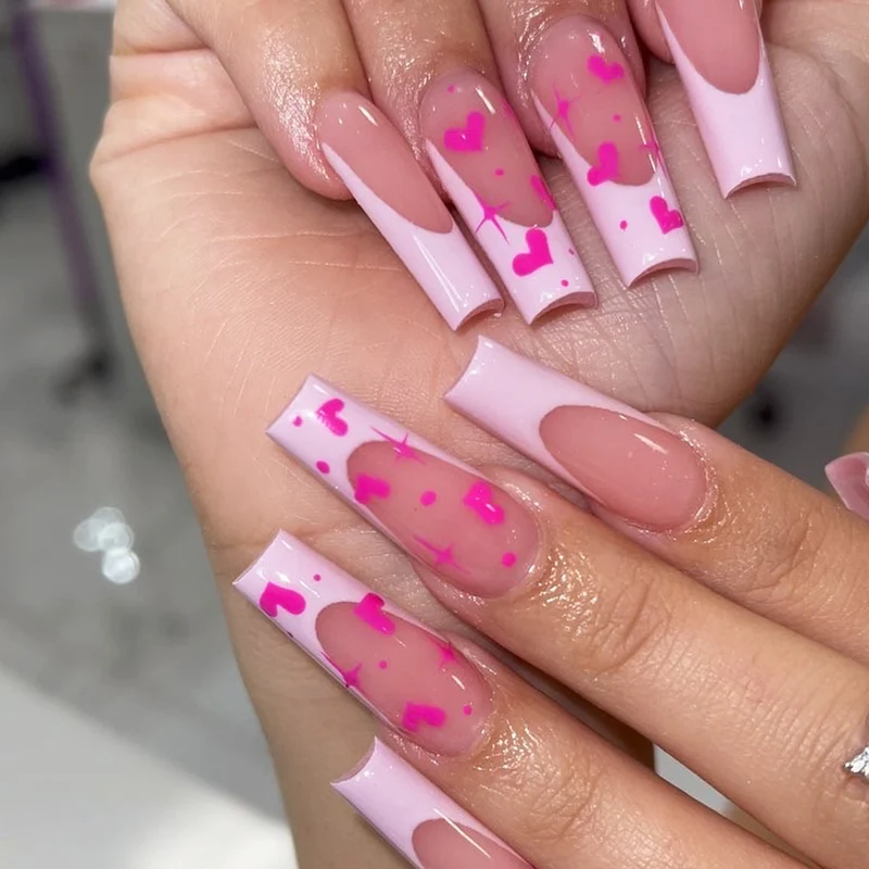 Artful Nail Extensions with Heart-Shaped Accents Stornfield